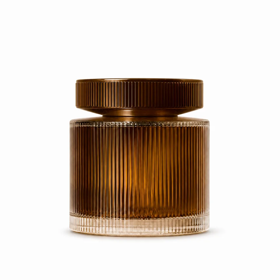 Ribbed amber glass perfume bottle with disc cap