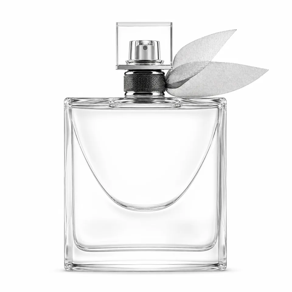 Wide clear glass perfume bottle with square cap and ribbon