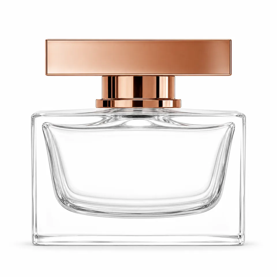 Wide rectangular clear glass perfume bottle with rose-gold T-bar cap